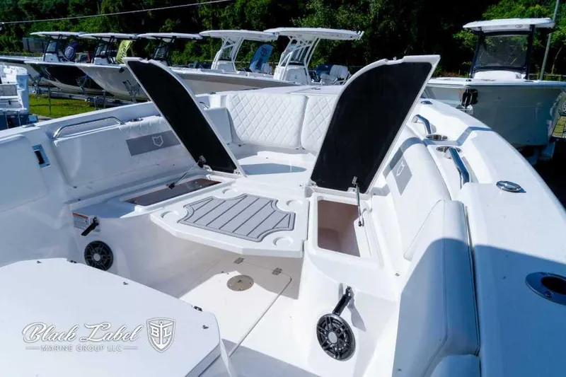 Slide: The Image of 2025 Sea Fox 268 Commander Center Console boat with open storage compartments. - 6