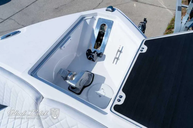 Slide: The Image of 2025 Sea Fox 268 Commander Center Console boat deck and storage compartment. - 9