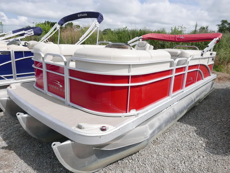 Slide: The Image of 2016 Bennington 208SL pontoon boat with red exterior and white interior. - 2