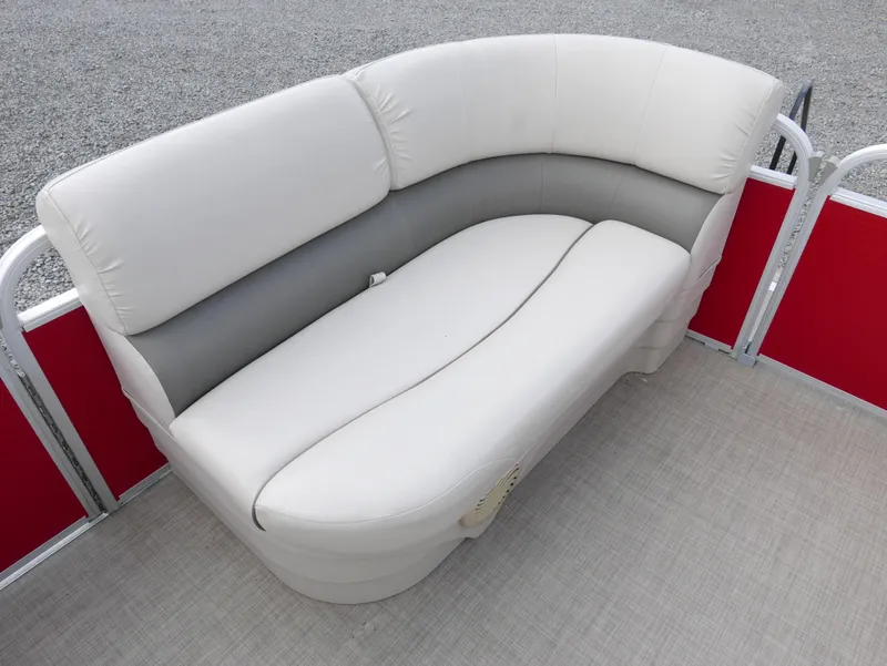Slide: The Image of 2016 Bennington 208SL pontoon boat with white and gray cushioned seating. - 5