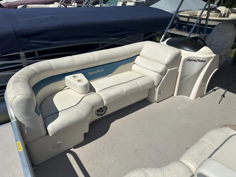 Slide: The Image of 2006 Godfrey Aqua Patio 200 RE pontoon boat with white and blue seating. - 7
