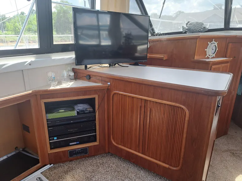 Slide: The Image of Interior of 1989 Carver 3807 yacht with TV and entertainment system. - 8
