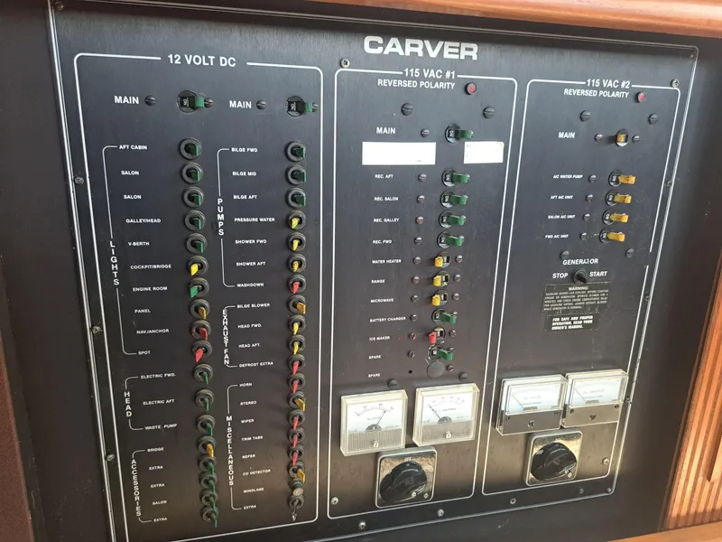Slide: The Image of Control panel of a 1989 Carver 3807 boat with various switches and gauges. - 9