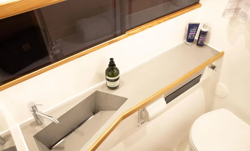 Slide: The Image of Modern bathroom in 2026 Dragonfly 40 yacht with sleek sink and toiletries. - 16