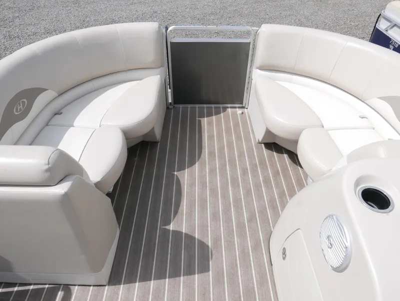 Slide: The Image of 2016 Harris 200 Cruiser interior with beige seating and striped flooring. - 6