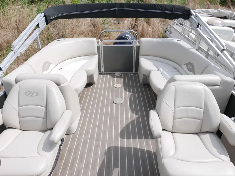 Slide: The Image of 2016 Harris 200 Cruiser pontoon boat with spacious seating and modern design. - 7