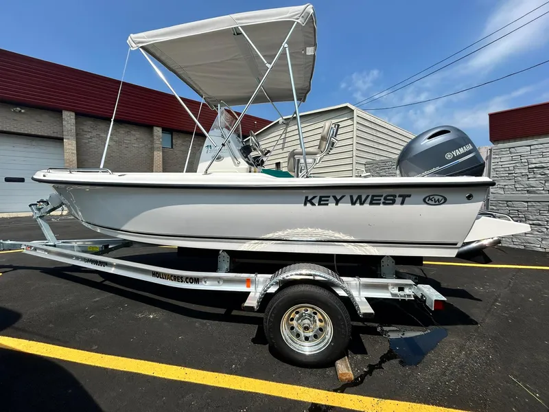 The Image of 2025 Key West 1720 Center Console boat on trailer with Yamaha outboard motor. - 0