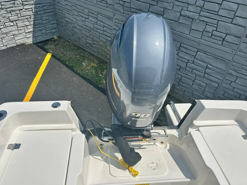 Slide: The Image of 2025 Key West 1720 Center Console boat with 90 HP Yamaha outboard motor. - 8
