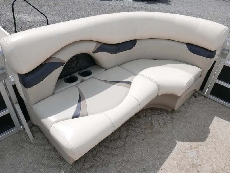 Slide: The Image of 2009 Sylvan Mirage 8520 Cruise boat seating with cup holders and stylish design. - 5