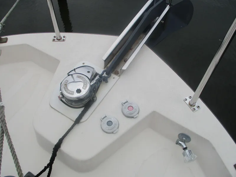 Slide: The Image of 1998 Nordic Tug 32 boat deck with winch and cleats. - 6