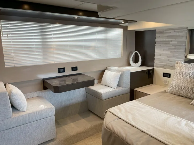 Slide: The Image of Luxurious interior of 2021 Cruisers Yachts 54 Cantius with modern seating and decor. - 18