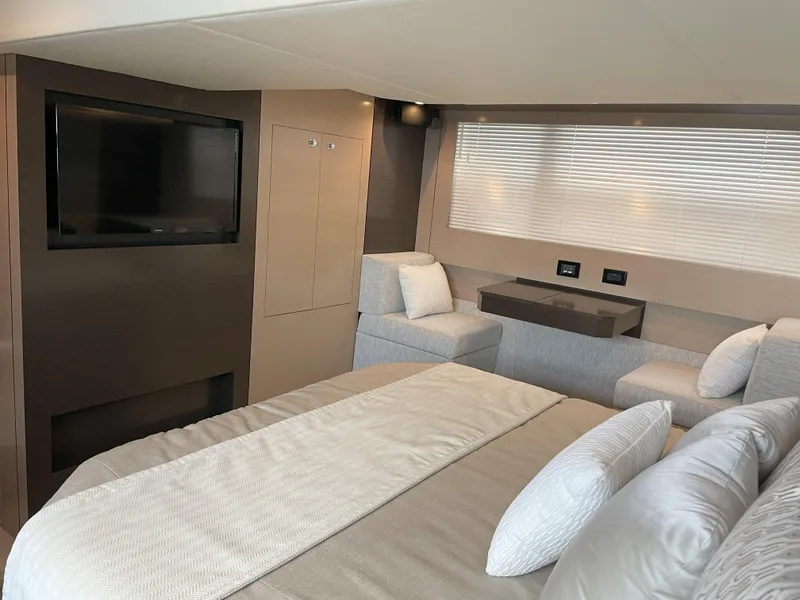 Slide: The Image of Luxurious interior of 2021 Cruisers Yachts 54 Cantius with modern furnishings and TV. - 20