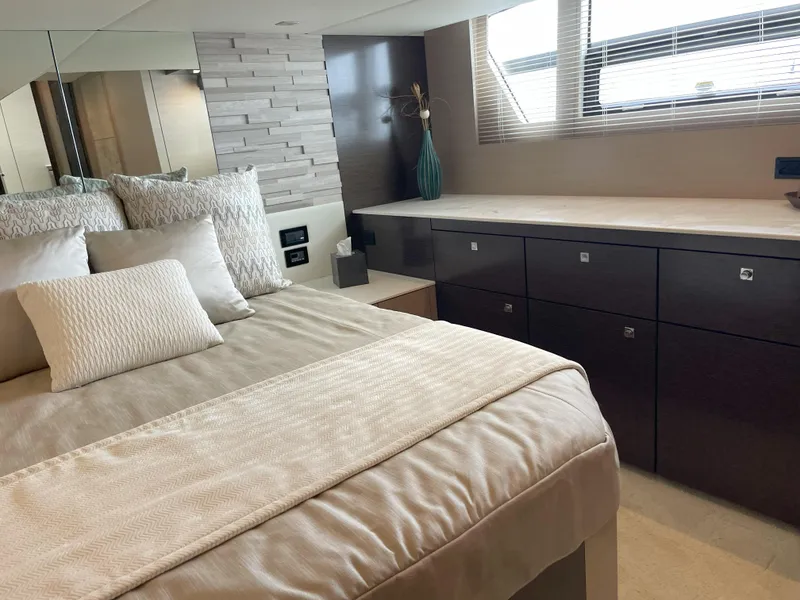 Slide: The Image of Luxurious bedroom interior of 2021 Cruisers Yachts 54 Cantius with modern decor. - 22