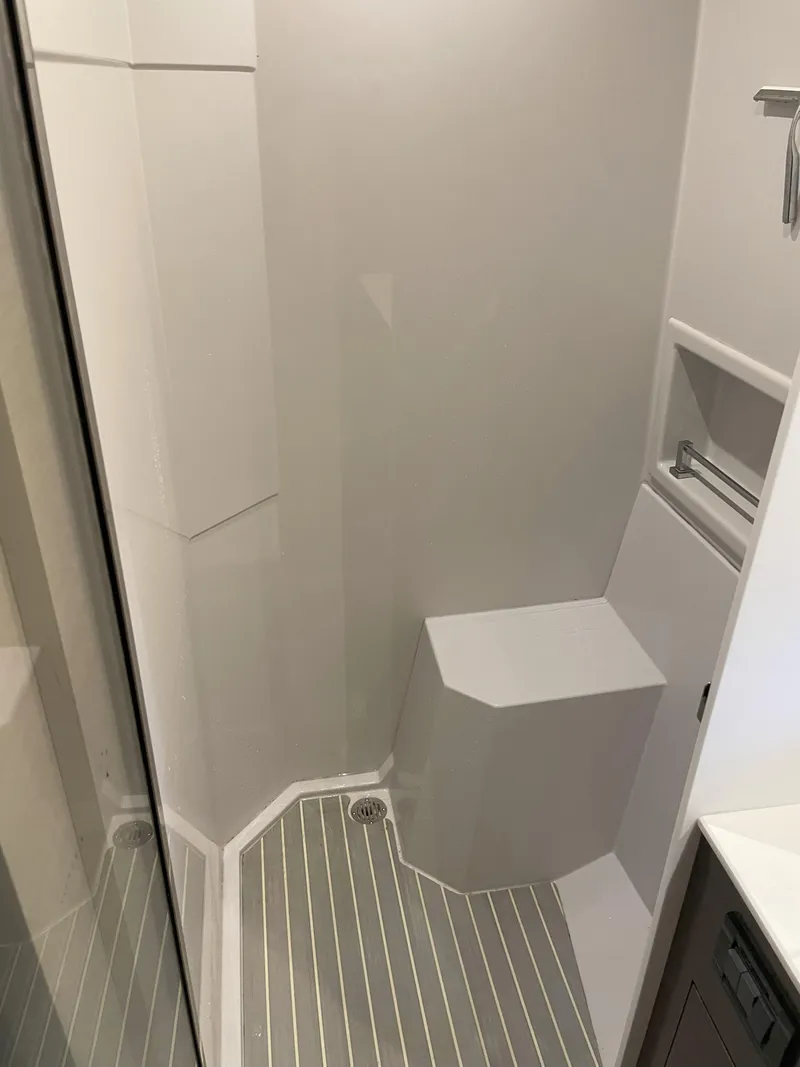 Slide: The Image of 2021 Cruisers Yachts 54 Cantius bathroom with modern shower design. - 26