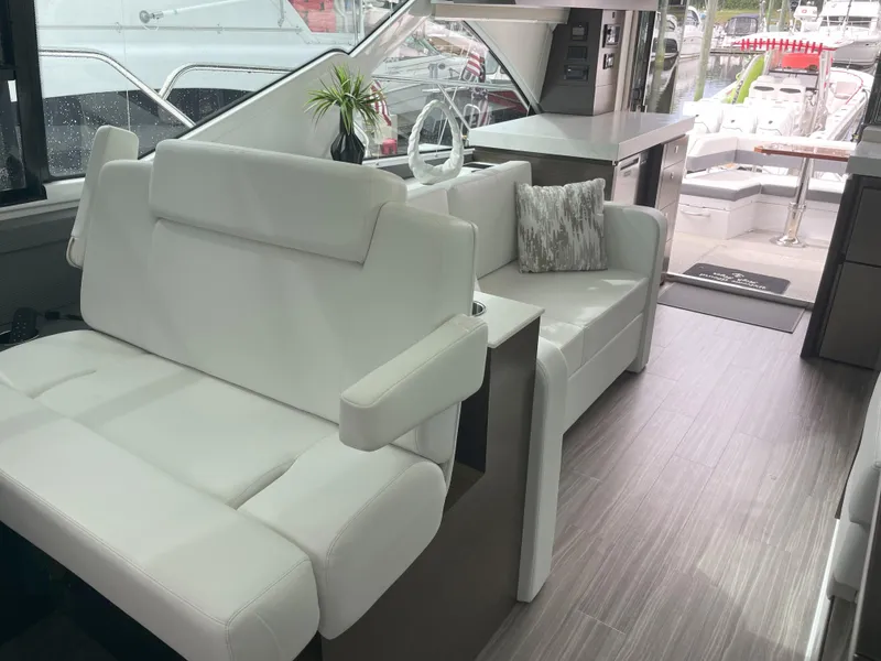 Slide: The Image of Luxurious interior of 2021 Cruisers Yachts 54 Cantius with modern seating and decor. - 42