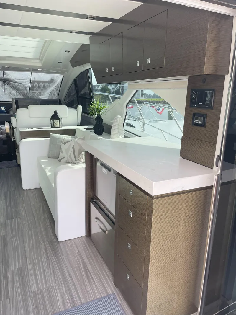 Slide: The Image of Luxurious interior of 2021 Cruisers Yachts 54 Cantius with modern furnishings. - 46
