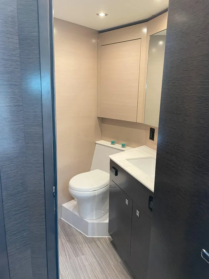 Slide: The Image of Modern bathroom in 2021 Cruisers Yachts 54 Cantius, featuring sleek design and fixtures. - 9