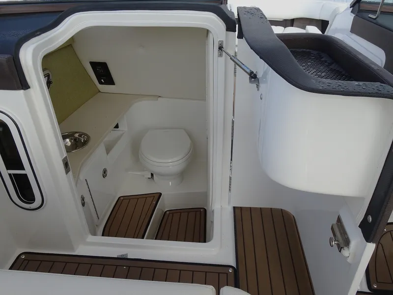 Slide: The Image of 2018 Cobalt R30 boat interior with toilet and sink. - 23