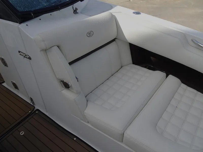 Slide: The Image of 2018 Cobalt R30 boat with white leather seating and teak flooring. - 26