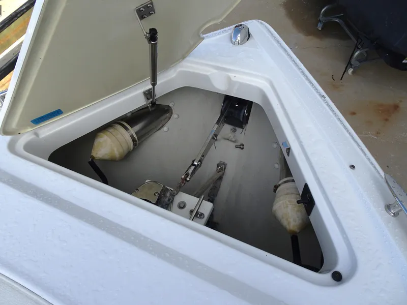 Slide: The Image of 2018 Cobalt R30 boat storage compartment with open hatch. - 27
