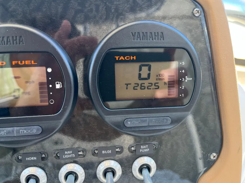 Slide: The Image of Close-up of Yamaha tachometer and fuel gauge on 2015 Sea Fox 220 Viper boat. - 10