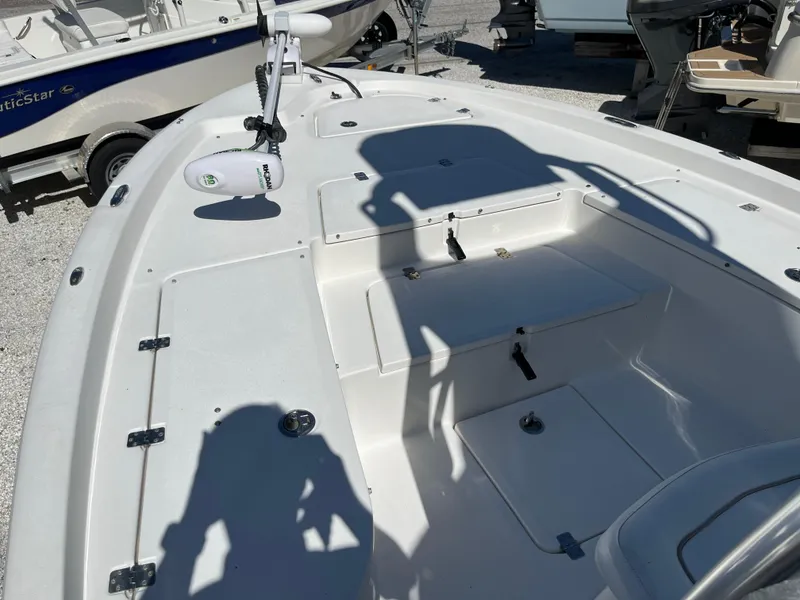 Slide: The Image of 2015 Sea Fox 220 Viper boat deck with storage compartments and fishing equipment. - 5