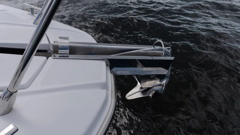 Slide: The Image of Anchor system on 2023 Azimut Atlantis 45 yacht, positioned over water. - 18