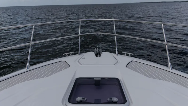 Slide: The Image of 2023 Azimut Atlantis 45 yacht bow view on open water. - 21