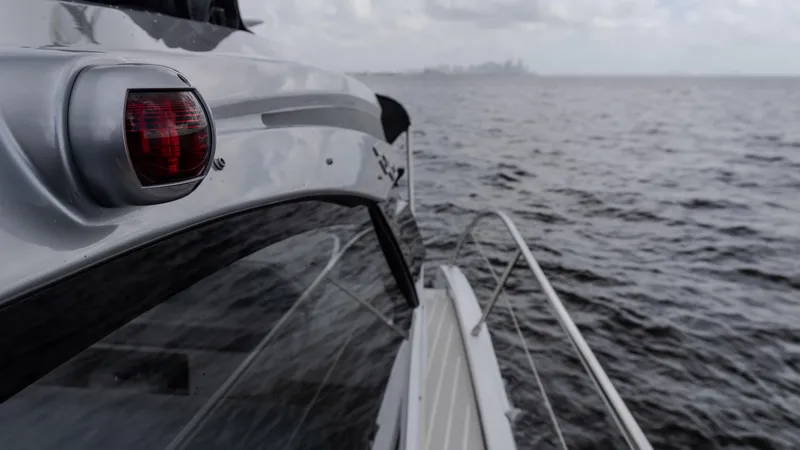 Slide: The Image of 2023 Azimut Atlantis 45 yacht cruising on open water, side view. - 31