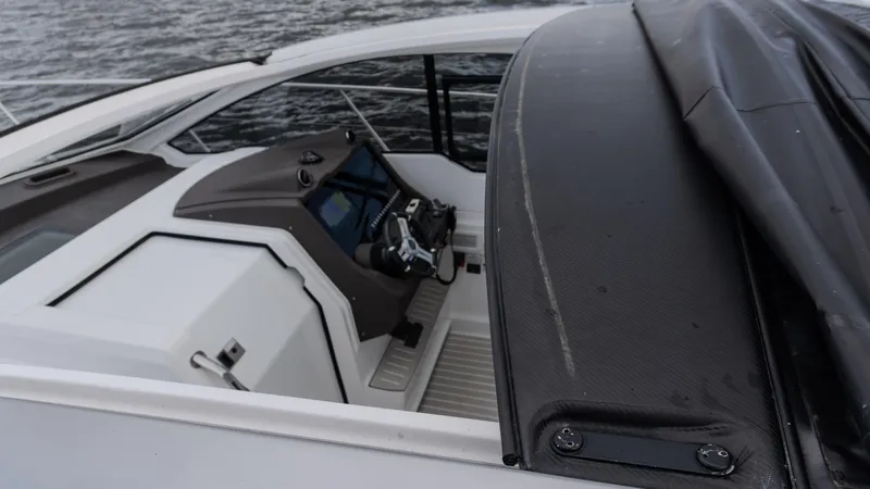 Slide: The Image of 2023 Azimut Atlantis 45 yacht helm with modern controls and sleek design. - 32