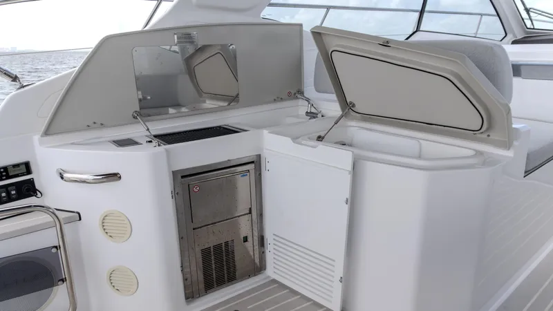 Slide: The Image of 2023 Azimut Atlantis 45 yacht interior with open storage compartments and sleek design. - 49