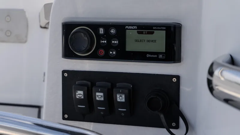 Slide: The Image of Control panel of 2023 Azimut Atlantis 45 yacht with audio system and switches. - 7