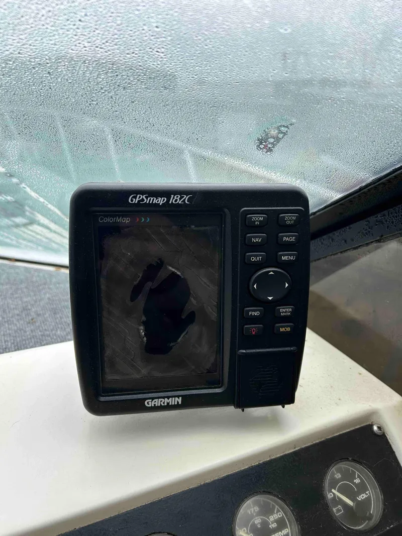 Slide: The Image of Garmin GPSmap 182C on 1991 Silverton 34 Express Cruiser dashboard. - 10
