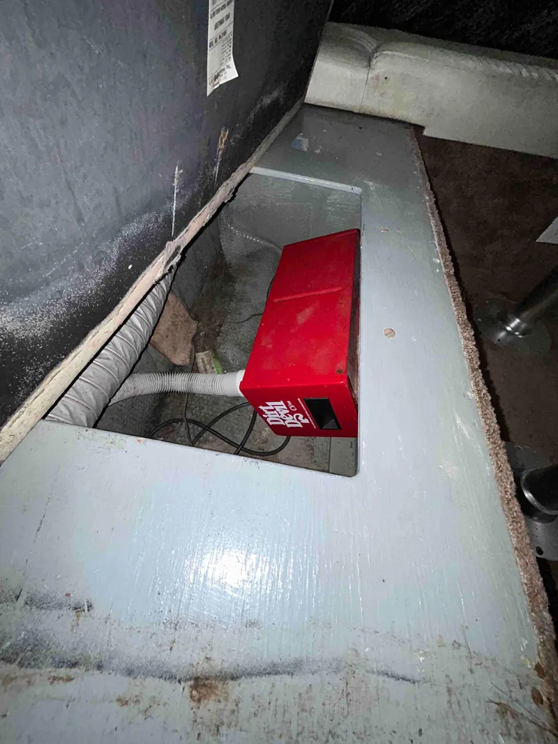 Slide: The Image of Red electrical box inside a 1991 Silverton 34 Express Cruiser boat compartment. - 17