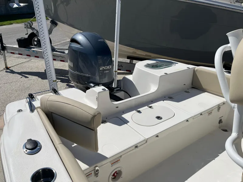 Slide: The Image of 2022 NauticStar 2302 Legacy boat with Yamaha 200 outboard motor. - 7