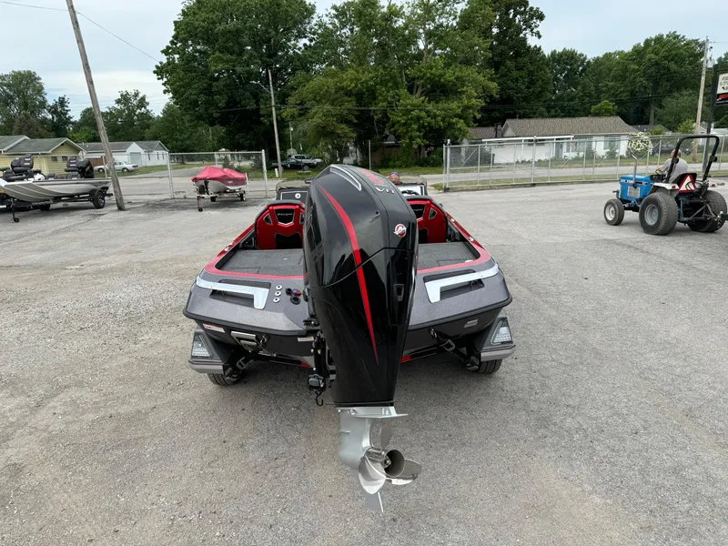 Slide: The Image of 2024 Ranger Z520R Ranger Cup Equipped boat, rear view, parked on gravel lot. - 5