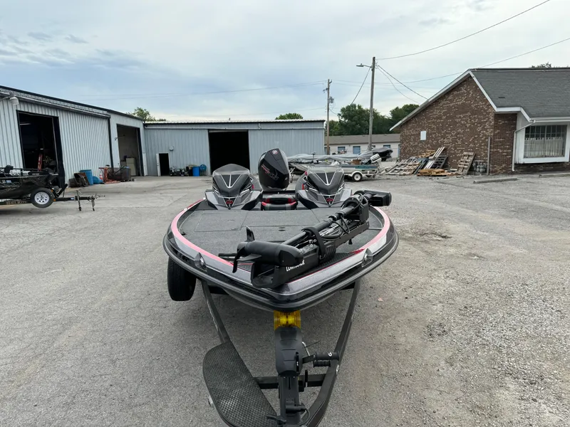 Slide: The Image of 2024 Ranger Z520R Ranger Cup Equipped boat in a yard, front view. - 7