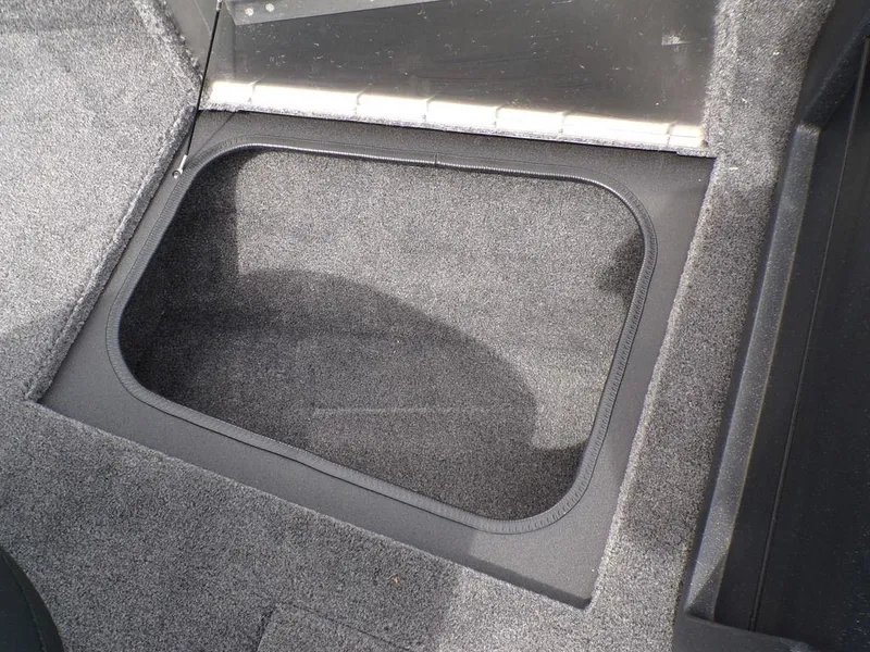Slide: The Image of 2025 Tracker Pro Guide™ V-175 Combo storage compartment with carpeted interior. - 19