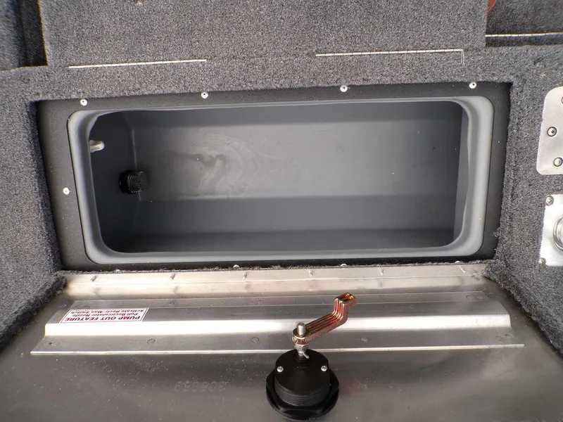 Slide: The Image of 2025 Tracker Pro Guide V-175 Combo boat storage compartment interior. - 26