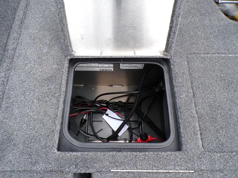 Slide: The Image of 2025 Tracker Pro Guide V-175 Combo storage compartment with wiring. - 28