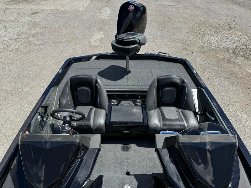 Slide: The Image of 2024 Ranger Z519 Garmin Ranger Cup Equipped boat interior with dual seats and steering. - 15