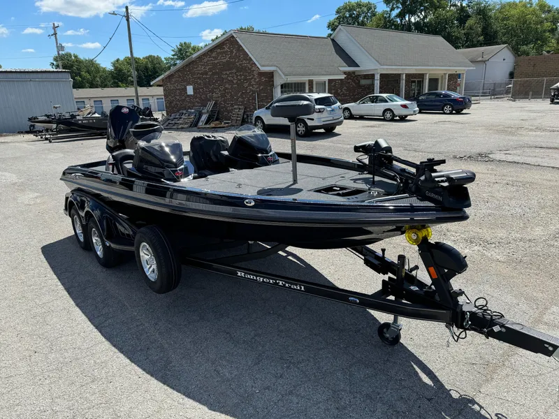 Slide: The Image of 2024 Ranger Z519 Garmin Ranger Cup Equipped boat on trailer in parking lot. - 5