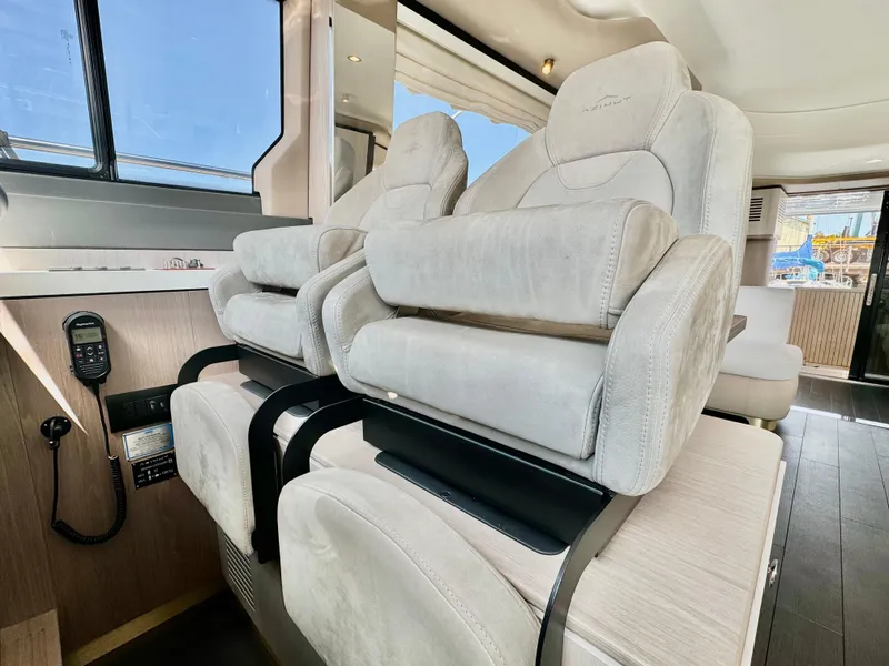 Slide: The Image of Luxurious interior seating of 2024 Azimut Fly 60 yacht, featuring plush, modern design. - 15