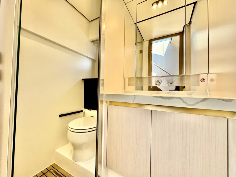 Slide: The Image of Luxurious bathroom in 2024 Azimut Fly 60 yacht with modern fixtures. - 17