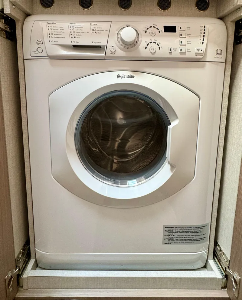 Slide: The Image of Splendide washing machine in 2024 Azimut Fly 60 yacht interior. - 22
