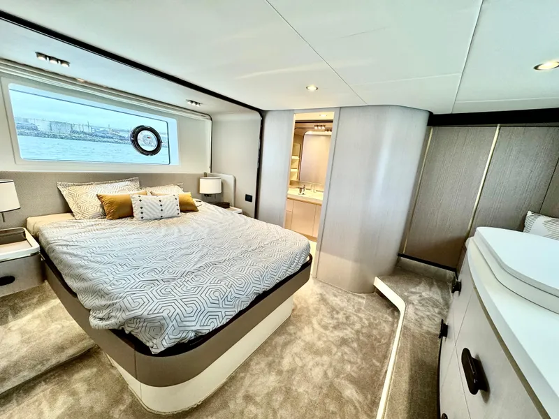 Slide: The Image of Luxurious bedroom interior of 2024 Azimut Fly 60 yacht with modern design and elegant furnishings. - 23