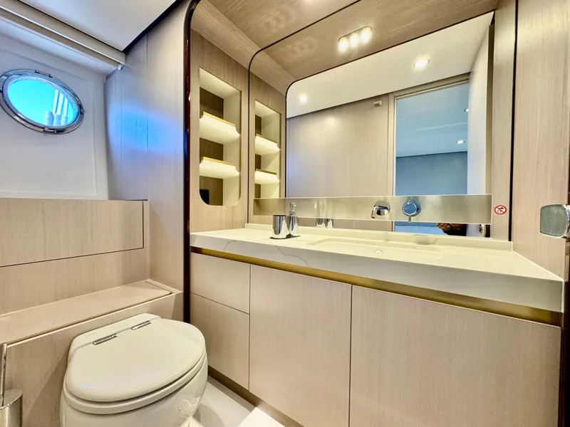 Slide: The Image of Luxurious bathroom in 2024 Azimut Fly 60 yacht with modern fixtures and elegant design. - 25