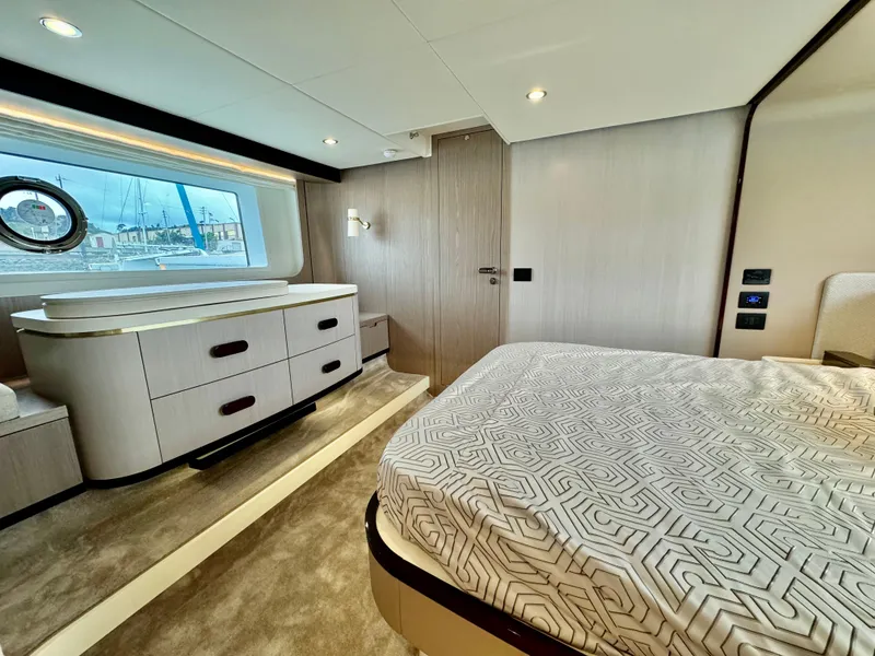 Slide: The Image of Luxurious bedroom interior of 2024 Azimut Fly 60 yacht with modern furnishings. - 27