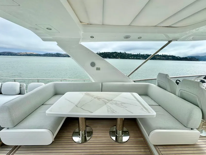 Slide: The Image of Luxurious seating area on 2024 Azimut Fly 60 yacht with scenic water view. - 38