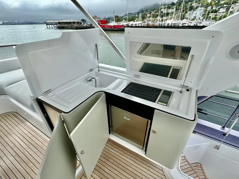 Slide: The Image of Outdoor kitchen on 2024 Azimut Fly 60 yacht with sink and storage. - 41